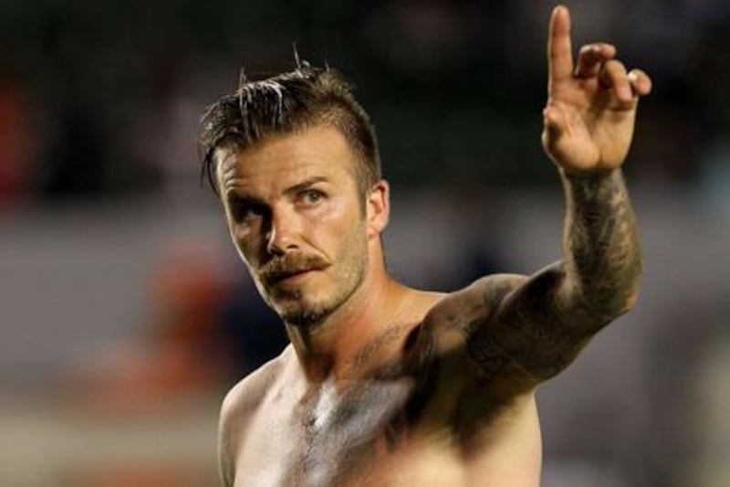CARSON, CA - JUNE 23: David Beckham #23 of the Los Angeles Galaxy salutes the fans after the game with the Vancouver Whitecaps at The Home Depot Center on June 23, 2012 in Carson, California. The Galaxy won 3-0.   Stephen Dunn/Getty Images/AFP== FOR NEWSPAPERS, INTERNET, TELCOS & TELEVISION USE ONLY ==

