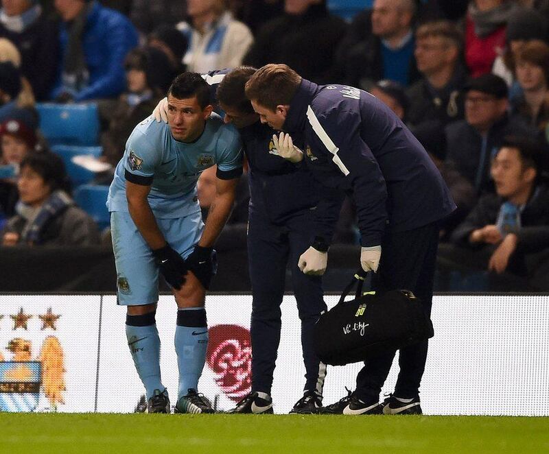 Sergio Aguero of Manchester City leaves the field injured during his team's 1-0 Premier League victory over Everton on Saturday at the Etihad Stadium. Laurence Griffiths / Getty Images / December 6, 2014