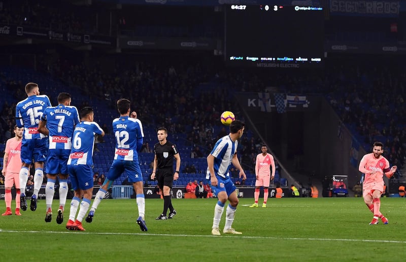 Lionel Messi scores Barcelona's fourth goal against Espanyol. Getty Images