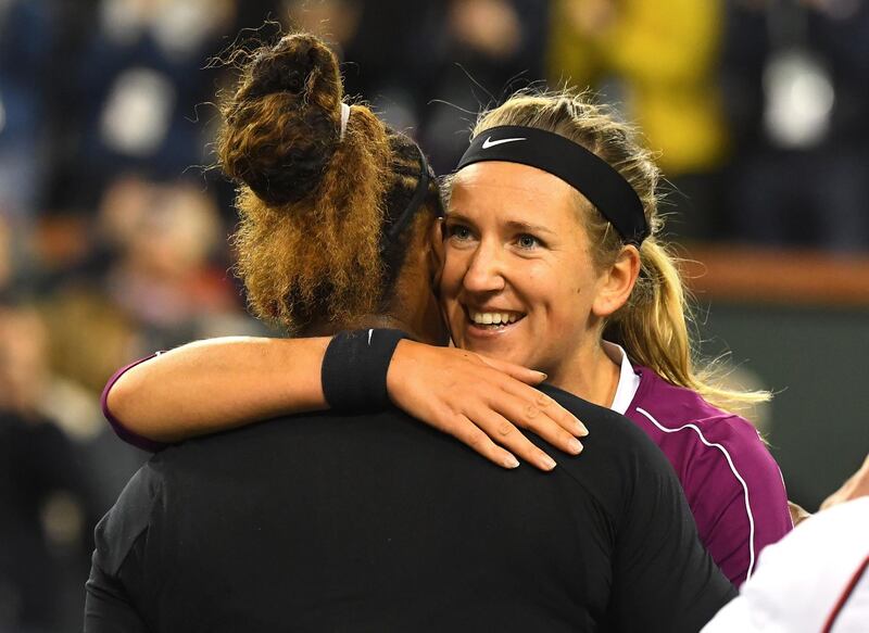 Victoria Azarenka of Belarus embraces American Serena Williams after losing her second-round match in Indian Wells. Reuters