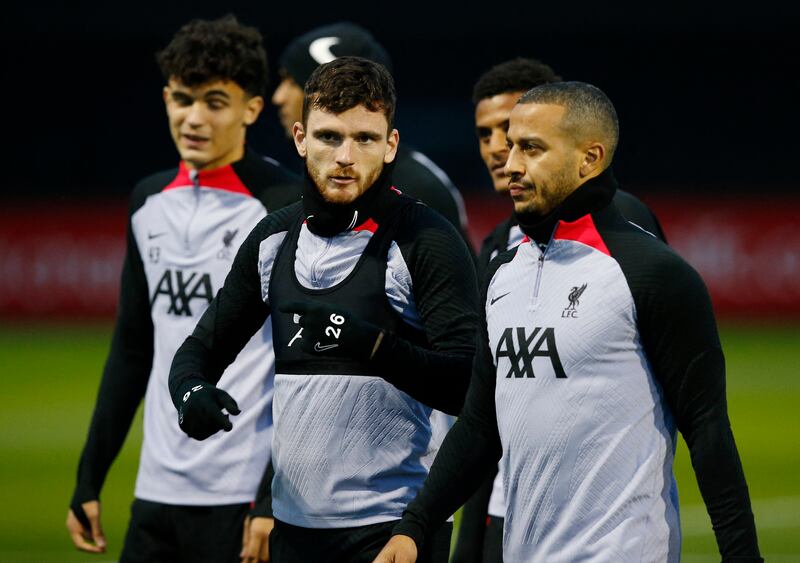 Liverpool's Thiago Alcantara and Andrew Robertson at training. Reuters