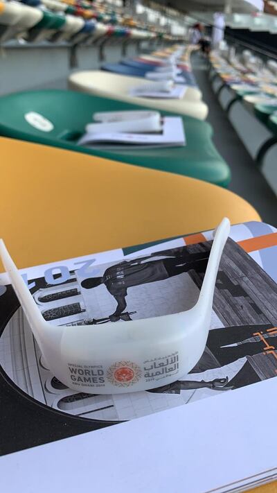 A wristband and programme of events lie waiting at the opening of Zayed Sports City. Victor Besa/The National