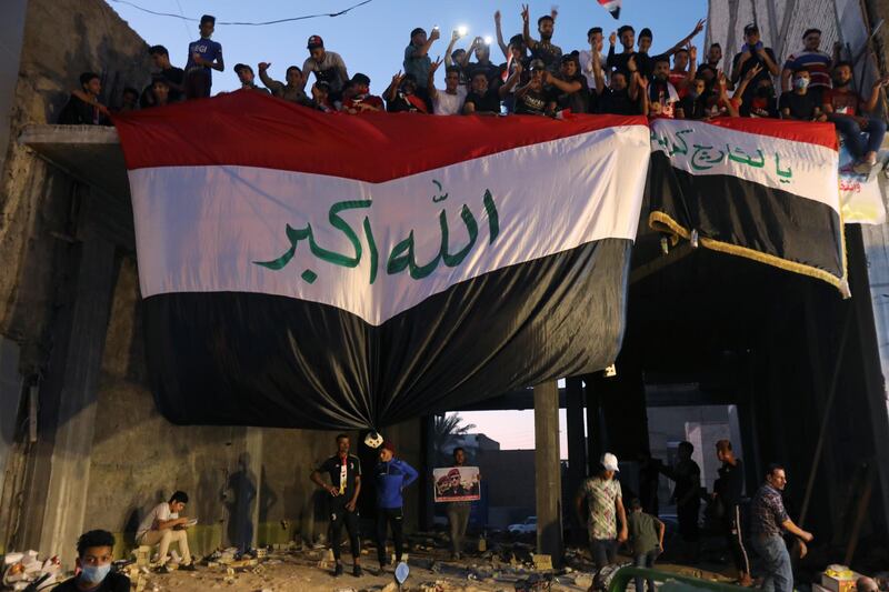 Demonstrators gesture during an anti-government protest in Kerbala. Reuters