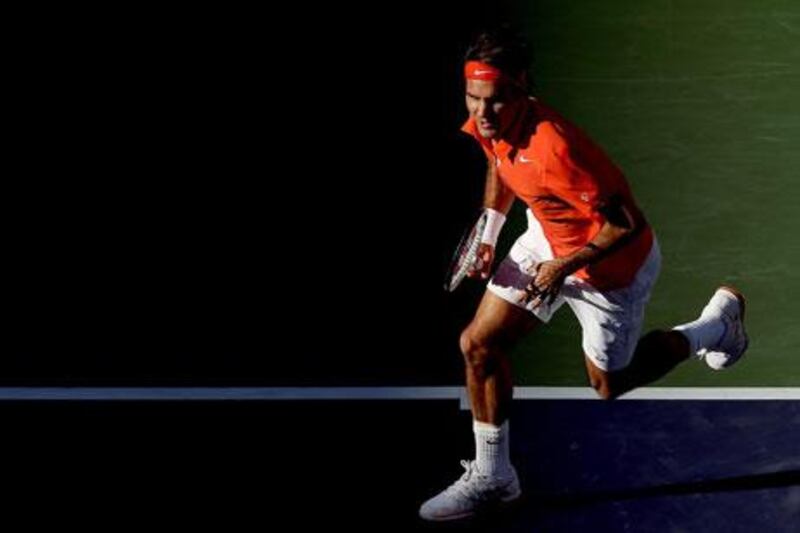 Roger Federer had to battle back problems on his way to a win at the Indian Wells.