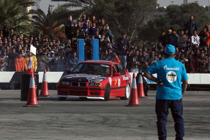 A driver negotiates obstacles at a drifting competition in Benghazi, Libya. Points are awarded by judges for the angles achieved and smoothness of the drive. AFP
