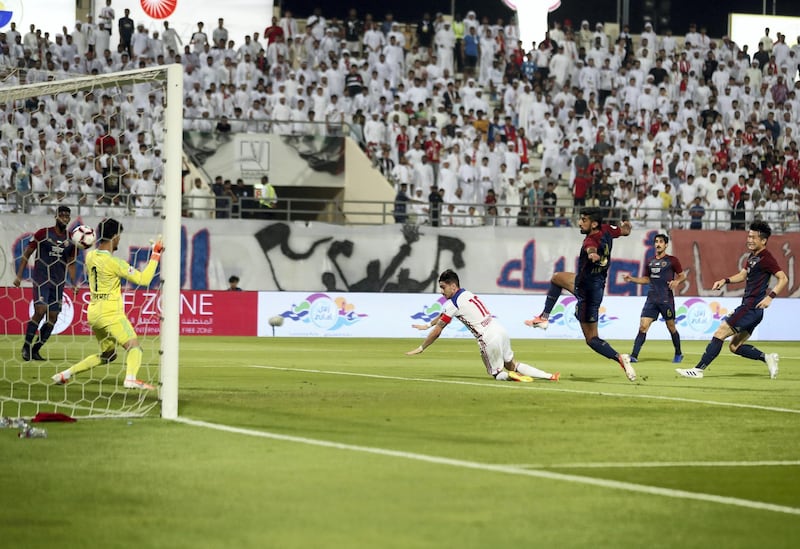 Sharjah, United Arab Emirates - May 15, 2019: Football. Sharjah's Igor Coronado scores during the game between Sharjah and Al Wahda in the Arabian Gulf League. Wednesday the 15th of May 2019. Sharjah Football club, Sharjah. Chris Whiteoak / The National