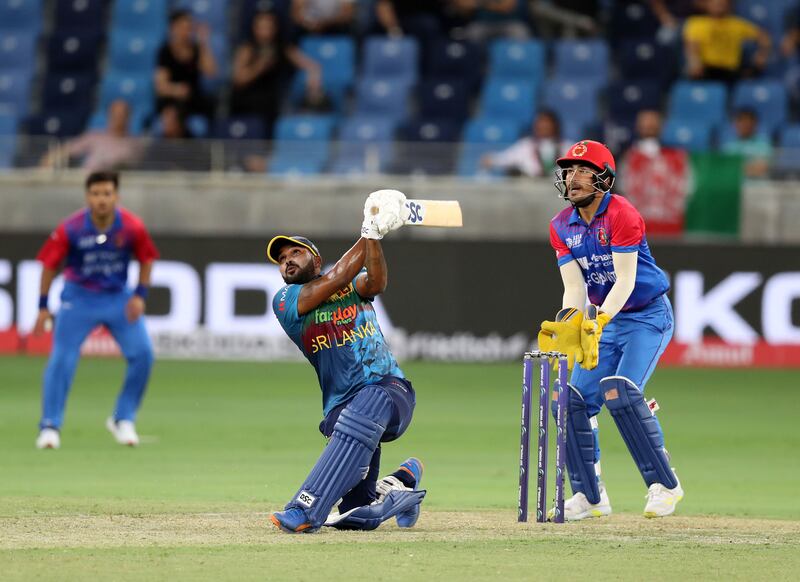 Sri Lanka's Wanindu Hasaranga tries to hit out. Chris Whiteoak / The National