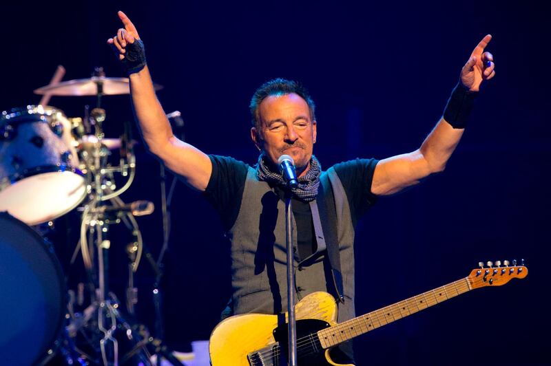 (FILES) In this file photo taken on July 11, 2016, US musician Bruce Springsteen performs with The E Street Band at the AccorHotels Arena in Paris. The Boss is back in town: Bruce Springsteen said on April 25, 2019 he will release his first new album in five years this June, promising a return to his signature ruminations on the American condition. Springsteen's 19th studio album "Western Stars," set for release June 14, drew inspiration from southern California pop classics of the 1960s and 70s, the legendary artist from New Jersey said. / AFP / BERTRAND GUAY
