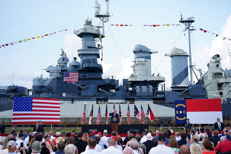 TOPSHOT - US President Donald Trump speaks at the Battleship North Carolina in Wilmington, North Carolina, on September 2, 2020, the 75th anniversary of the end of WWII. Trump will designate Wilmington as the first US World War II Heritage City. / AFP / MANDEL NGAN
