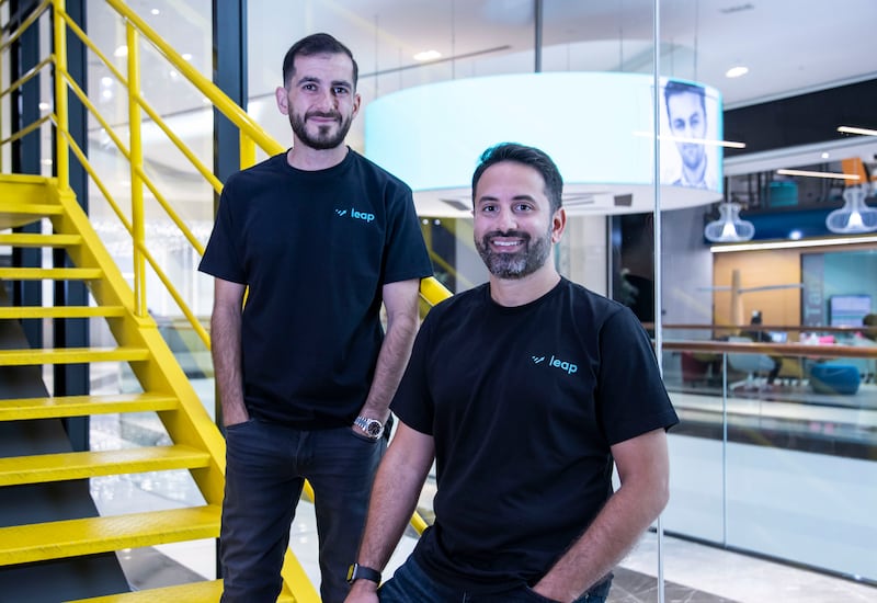 Jamil Khammu, left, and Ziad Toqan, founders of Leap, shared the same vision of creating a 'virtual helping hand' capable of helping youngsters to navigate financial matters. Ruel Pableo for The National
