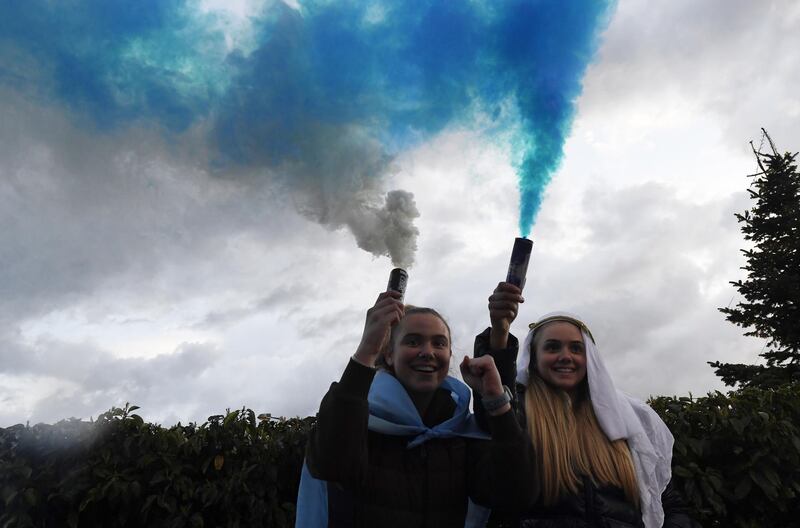 Manchester City supporters celebrate their club winning the Premier League title. EPA
