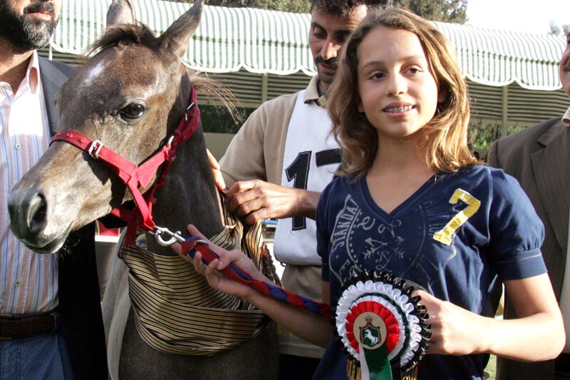Princess Iman, aged 12, with her horse Saqir, an Arabian filly, as they won second prize at the Middle East Championships horse show in Amman, in October 2008.  Reuters