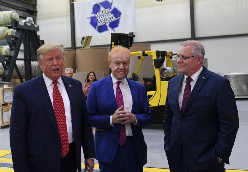 From left, Donald Trump, Anthony Pratt and Australia's then-prime minister Scott Morrison visit Pratt Industries during the plant's opening in Wapakoneta, Ohio, in 2019. AFP