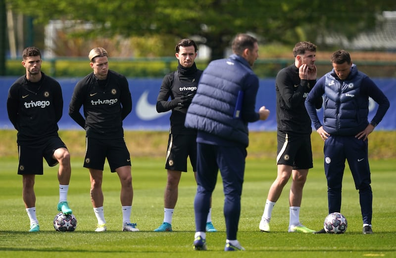Chelsea manager Frank Lampard with Christian Pulisic, left, Mykhailo Mudryk, Ben Chilwell, Mason Mount and assistant manager Joe Edwards, right, at Cobham Training Ground. PA