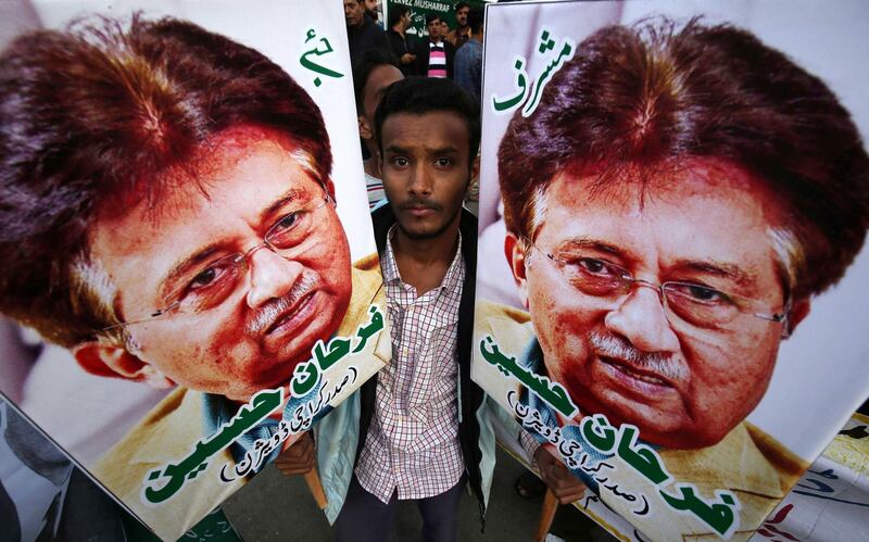 epa08079294 A supporter holds portraits of former President Pervez Musharraf during a protest against sentencing Musharraf to death in high treason case in Karachi, Pakistan, 18 December 2019. A Pakistan court on 17 December sentenced former president and military ruler Pervez Musharraf to death on charges of committing high treason in 2007 when he suspended the constitution and imposed a state of emergency. Musharraf, 76, has been living in Dubai since he was allowed to leave the country in March 2016 for medical treatment after a three-year travel ban.  EPA/SHAHZAIB AKBER