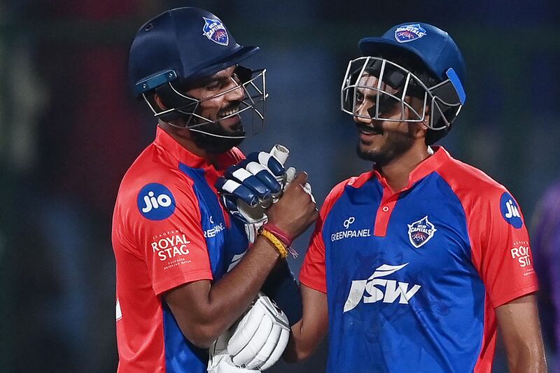 Delhi Capitals' Axar Patel, right, and Lalit Yadav celebrate their win over Kolkata Knight Riders at the Arun Jaitley Stadium. AFP