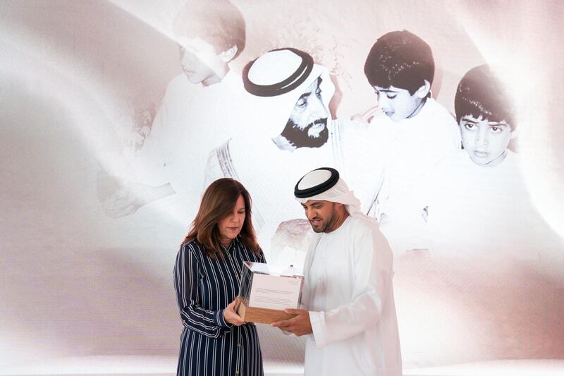 ABU DHABI, UNITED ARAB EMIRATES - March 13, 2019: HE Falah Mohamed Al Ahbabi, Chairman of the Department of Urban Planning and Municipalities, and Abu Dhabi Executive Council Member (R) and Karen Pence, Second Lady of the United States (L), exchange gifts during a reception for the Special Olympics World Games Abu Dhabi 2019, at the Founders Memorial.

( Mohammed Al Hammadi / Ministry of Presidential Affairs )?