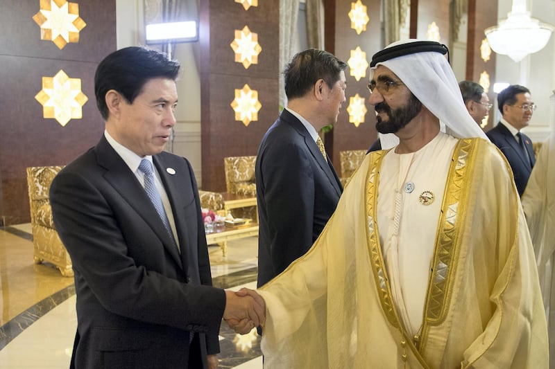 ABU DHABI, UNITED ARAB EMIRATES - July 19, 2018: HH Sheikh Mohamed bin Rashid Al Maktoum, Vice-President, Prime Minister of the UAE, Ruler of Dubai and Minister of Defence (R) greets a guest accompanying HE Xi Jinping, President of China (not shown), at the Presidential Airport.

( Saif Al Muhairi / Government of Dubai Media Office )
---