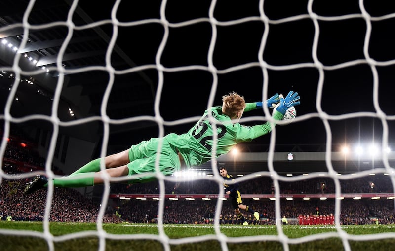 Liverpool goalkeeper Caoimhin Kelleher saves from Dani Ceballos during the penalty shootout. Getty