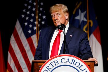 FILE PHOTO: Former U.S. President Donald Trump pauses while speaking at the North Carolina GOP convention dinner in Greenville, North Carolina, U.S. June 5, 2021. REUTERS/Jonathan Drake/File Photo