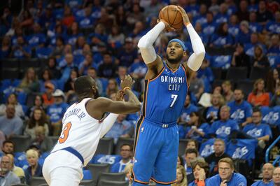 Oct 19, 2017; Oklahoma City, OK, USA;  Oklahoma City Thunder forward Carmelo Anthony (7) shoots the ball over New York Knicks guard Tim Hardaway Jr. (3) during the third quarter at Chesapeake Energy Arena. Mandatory Credit: Mark D. Smith-USA TODAY Sports