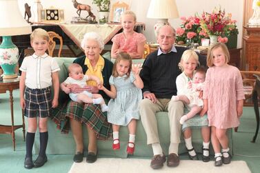 An undated handout picture released by Kensington Palace on April 14, 2021 shows Britain's Queen Elizabeth II and Britain's Prince Philip, Duke of Edinburgh with their great grandchildren. Pictured (L-R) are Britain's Prince George of Cambridge, Britain's Prince Louis of Cambridge being held by Britain's Queen Elizabeth II, Savannah Phillips (standing at rear), Britain's Princess Charlotte of Cambridge, Britain's Prince Philip, Duke of Edinburgh, Isla Phillips holding Lena Tindall, and Mia Tindall. - RESTRICTED TO EDITORIAL USE - MANDATORY CREDIT "AFP PHOTO / KENSINGTON PALACE / DUCHESS OF CAMBRIDGE" - NO MARKETING - NO ADVERTISING CAMPAIGNS - NO COMMERCIAL USE - RESTRICTED TO SUBSCRIPTION USE - STRICTLY NO SALES - DISTRIBUTED AS A SERVICE TO CLIENTS - NOT FOR USE AFTER DECEMBER 31, 2021. / AFP / KENSINGTON PALACE / THE DUCHESS OF CAMBRIDGE / RESTRICTED TO EDITORIAL USE - MANDATORY CREDIT "AFP PHOTO / KENSINGTON PALACE / DUCHESS OF CAMBRIDGE" - NO MARKETING - NO ADVERTISING CAMPAIGNS - NO COMMERCIAL USE - RESTRICTED TO SUBSCRIPTION USE - STRICTLY NO SALES - DISTRIBUTED AS A SERVICE TO CLIENTS - NOT FOR USE AFTER DECEMBER 31, 2021.