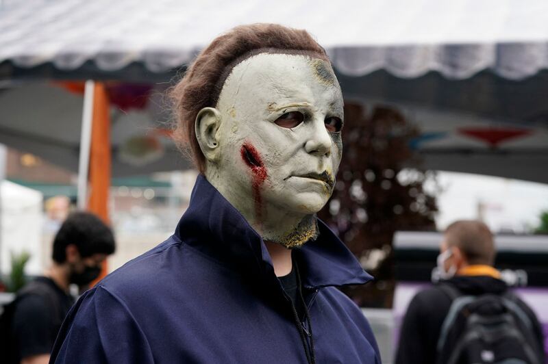 An attendee cosplays as Michael Myers at New York Comic Con. Timothy A Clary / AFP