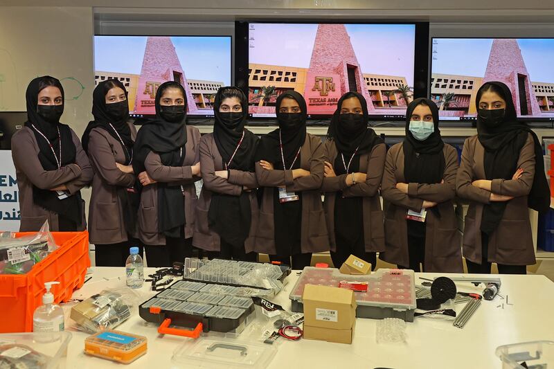 Members of an all-girl Afghan robotics team pose for a picture at the laboratory of Qatar's Texas A&M university in the capital Doha. All photos: AFP