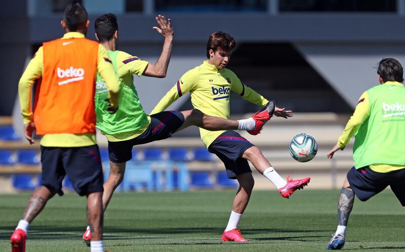 Riqui Puig controls the ball during a training session at Ciutat Esportiva Joan Gamper. Getty Images