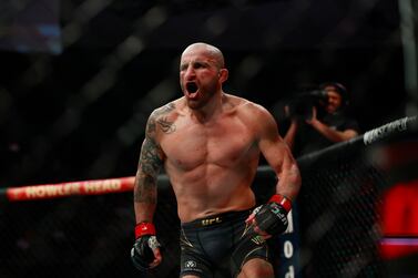 Alexander Volkanovski reacts to his win over Chan Sung Jung, better known as "the Korean Zombie," in the fourth round in the featherweight title bout at UFC 273 in Jacksonville, Fla. , Saturday, April 9, 2022.  (Corey Perrine / The Florida Times-Union via AP)