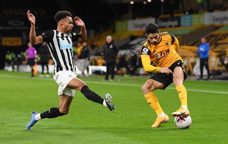 Newcastle United's Jacob Murphy with Wolverhampton Wanderers' Pedro Neto. Reuters