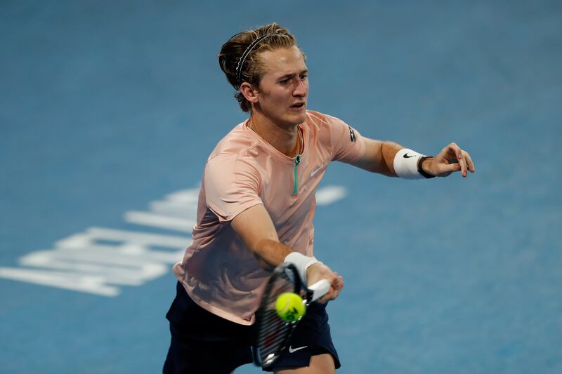 Sebastian Korda plays a forehand to Novak Djokovic during the Adelaide International final. EPA