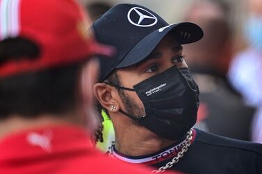 Mercedes' British driver Lewis Hamilton looks on ahead of the drivers parade prior to the Monaco Formula 1 Grand Prix at the Monaco street circuit in Monaco, on May 23, 2021. / AFP / ANDREJ ISAKOVIC