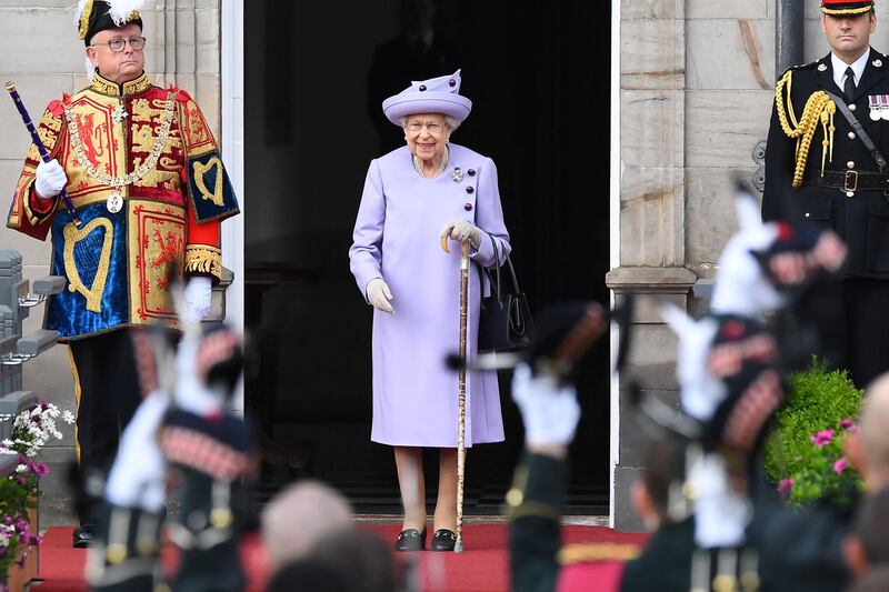 Queen Elizabeth II attends an Armed Forces Act of Loyalty Parade at the Palace of Holyroodhouse in Edinburgh, Scotland. AFP