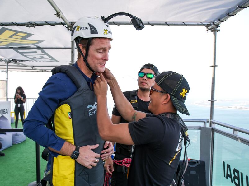 December 4, 2017.  Dubai Marina Mall.  The National reporter, Nick Webster,  gets on the XDubai Zipline, the World's Longest Urban Zipline.  Nick is helped with his zipline gear.
Victor Besa for The National
National
Reporter:  Nick Webster