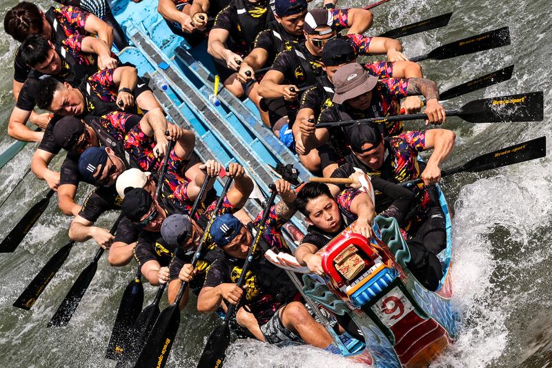 Participants celebrate the Dragon Boat Festival in Taipei, Taiwan, on Saturday, June 8. The festival typically falls on the fifth day of the fifth month in the Chinese lunar calendar in honour of Qu Yuan, an ancient Chinese poet and statesman. EPA