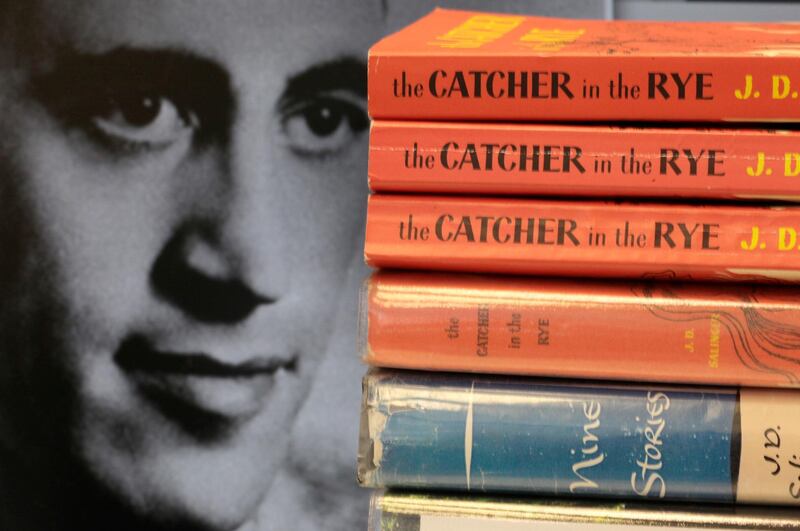 FILE - This Thursday, Jan. 28, 2010, file photo shows copies of J.D. Salinger's classic novel "The Catcher in the Rye" as well as his volume of short stories called "Nine Stories" at the Orange Public Library in Orange Village, Ohio. With Salingerâ€™s centennial coming in 2019, the big news so far is that his publisher is planning to celebrate it. Little, Brown and Company announced Tuesday, Sept. 4, 2018, that new editions of â€œThe Catcher in the Ryeâ€ and his three other books would be released in November. (AP Photo/Amy Sancetta, File)