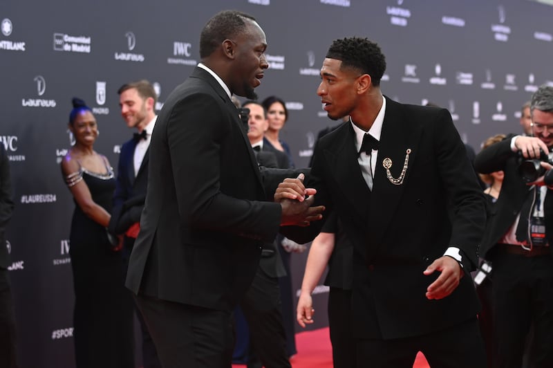 Usain Bolt and Jude Bellingham talk on the red carpet at the 2024 Laureus World Sports Awards. Getty