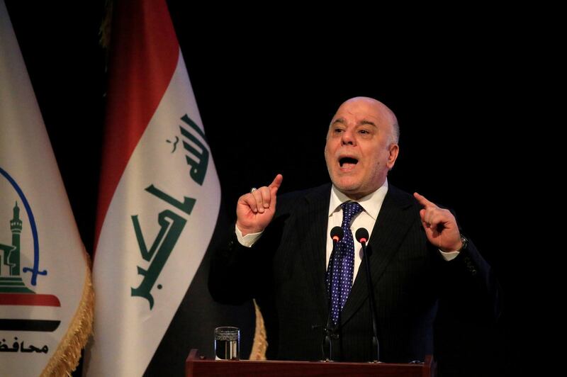 FILE PHOTO: Iraq's Prime Minister Haider al-Abadi speaks during a ceremony in Najaf, Iraq January 7, 2018. REUTERS/Alaa Al-Marjani - /File Photo