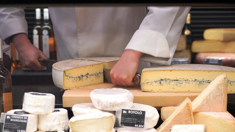 French cheese is displayed for sale at a supermarket in Joinville-le-Pont, near Paris, as sales of cheese eaten at home has rocketed over the last year amid lockdowns and restrictions in France, March 25, 2021, in this screen grab taken from a video. Picture taken March 25, 2021. Lucien Libert/REUTERS TV via REUTERS