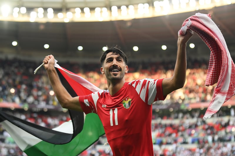 Yazan Al Naimat celebrates after Jordan's Asian Cup quarter-final win over Tajikistan. Getty Images
