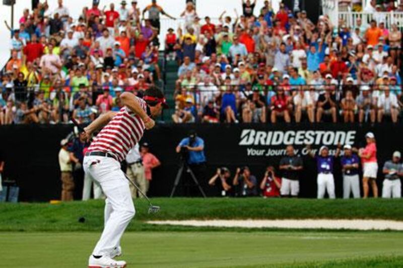 Keegan Bradley celebrates his par putt on the 18th at Firestone Country Club to secure the Bridgestone Invitational