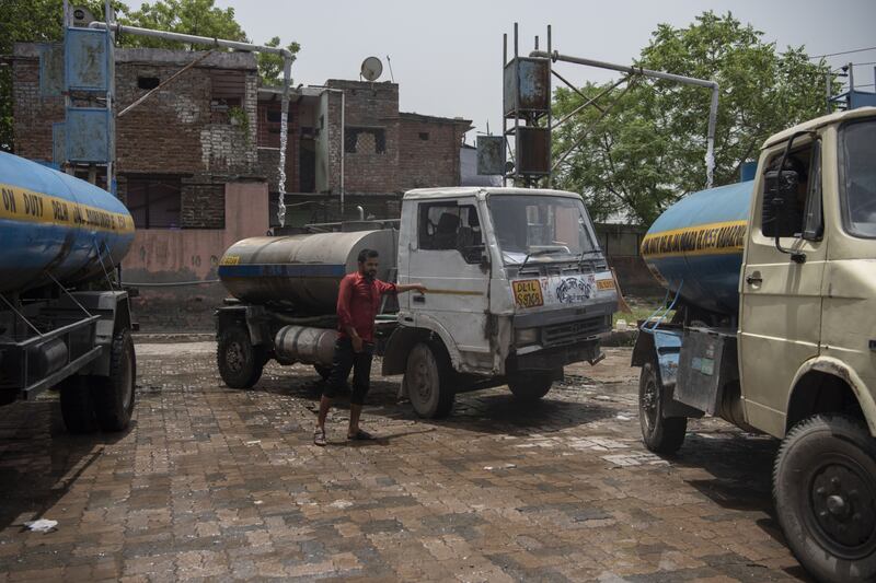 Water tankers are filled in New Delhi, India, as another heatwave is forecast in the months ahead. Bloomberg