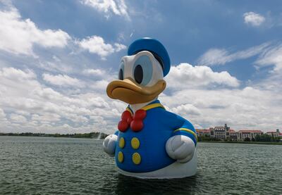 A Donald Duck mascot floats on a lake at Shanghai Disneyland in 2022. Photo: EPA/Alex Plaveski 