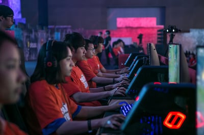Gamers of the SK Telecom professional video-game team, sponsored by SK Telecom Co., play the League of Legends game during a tournament at the 5GX Game Festival in Goyang, South Korea, on Friday, Aug. 10, 2018. Professional video gaming began in South Korea more than a decade ago, and has given rise to leagues that now pack stadiums and draw hundreds of thousands of eyeballs to Twitch livestreams for tournaments. Photographer: Jean Chung/Bloomberg