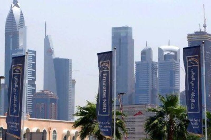 Emirates NBD's earnings were the lowest since December 2008 and fell far short of analysts' expectations of Dh781m.Above, the bank's branding in Dubai. Randi Sokoloff / The National