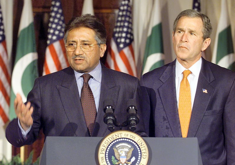 US President George W. Bush (R) and Pakastani President General Pervez Musharraf speak to reporters 13 February 2002 at the White House after their meeting there.  Pervez has worked closely with the US Government in its war in Afghanistan.         AFP PHOTO/Luke FRAZZA (Photo by LUKE FRAZZA / AFP)