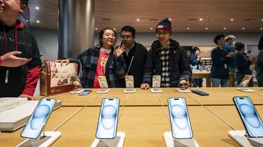The latest iPhone 15 series on display during the opening of the new Apple Store in Jing'An, Shanghai, on Thursday. Bloomberg