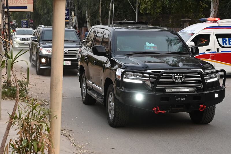 Former Pakistani prime minister Imran Khan is taken from a hospital in Lahore after being treated for a gunshot wound. He was fired upon on November 3 at a crowded rally in Wazirabad. EPA