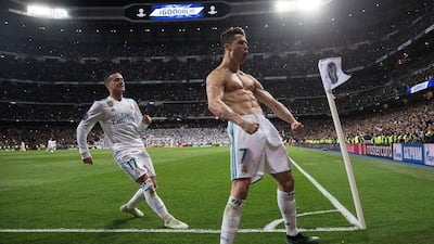 Cristiano Ronaldo celebrates scoring the last-minute penalty that saw Real Madrid squeak past Juventus at the Bernabeu and into the Uefa Champions League semi-finals. Rodrigo Jimenez / EPA